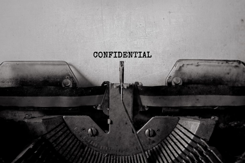 máquina de escrever escrito confidentiality